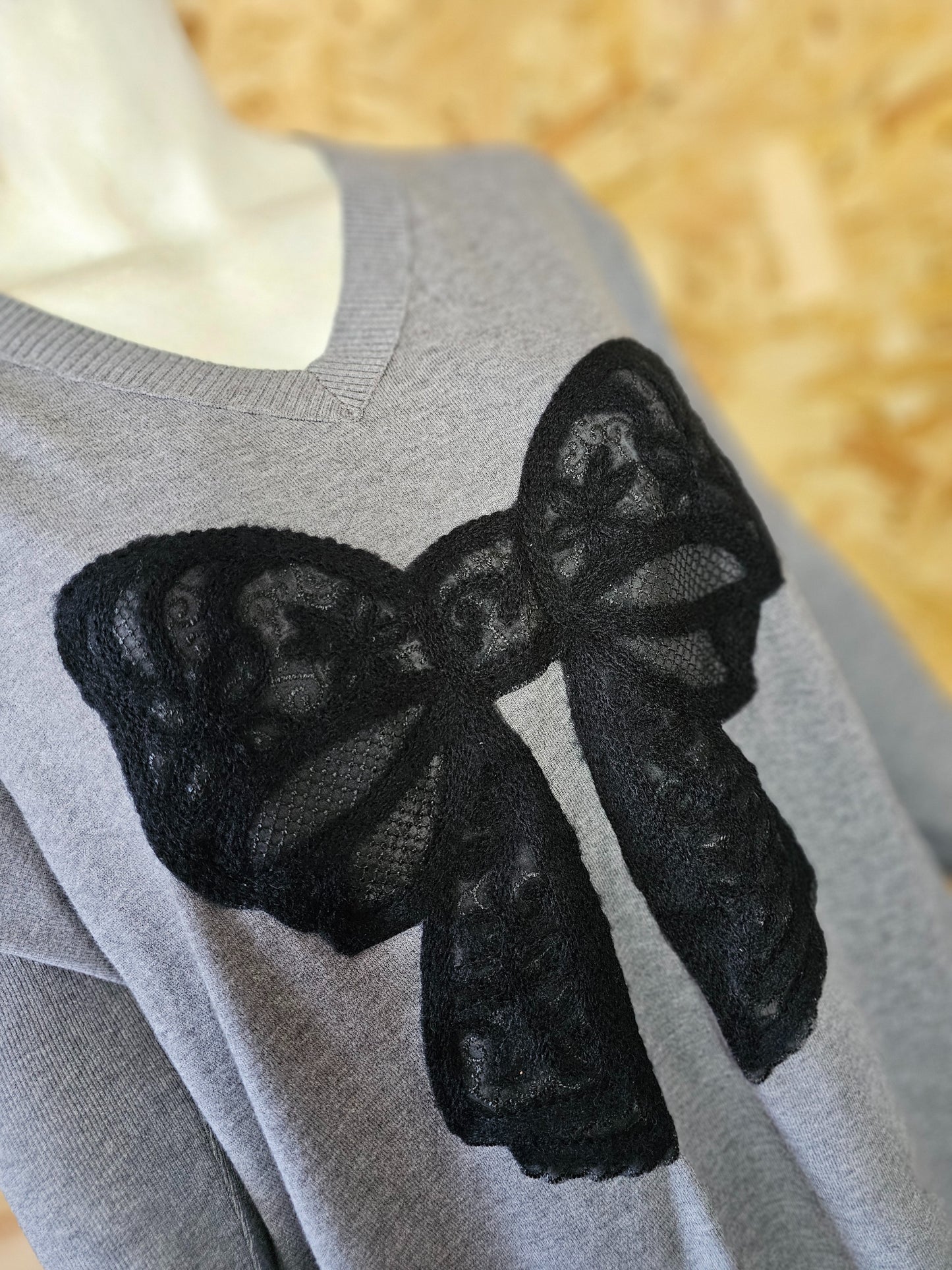 Pull long gris et son joli gros nœud