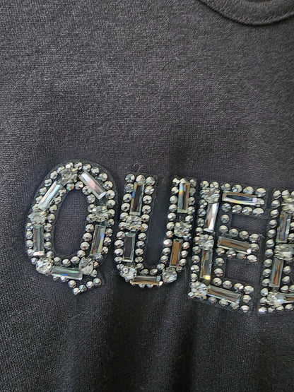 Pull noir, Queen strass
