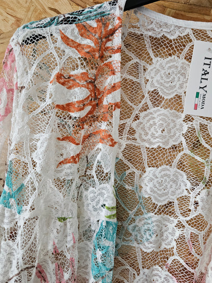Veste de dentelle motifs végétaux