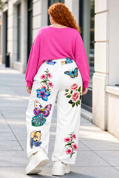 Pantalon blanc stretch,  motifs floraux et papillons colorés