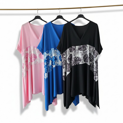 Robe asymétrie unie avec pan de tissu exotique