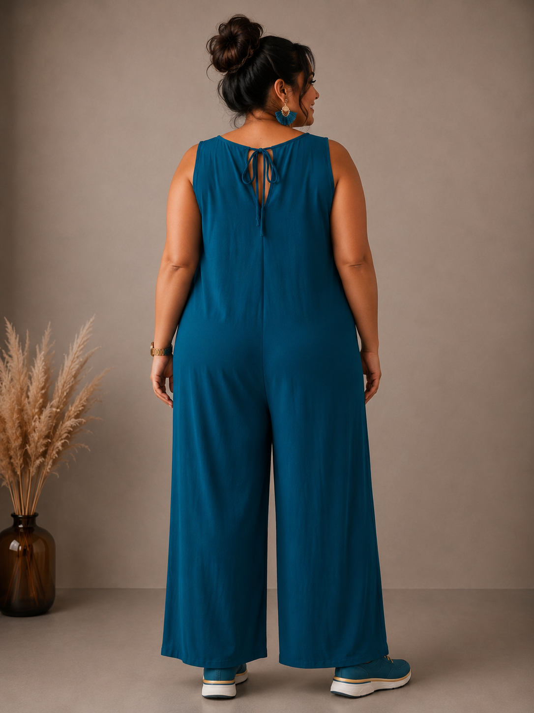 Combinaison avec drapé asymétrique devant