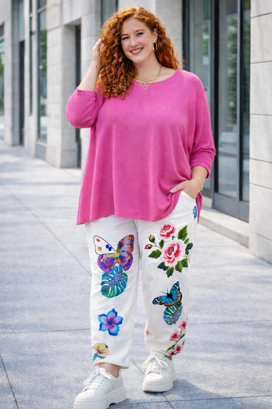 Pantalon blanc stretch,  motifs floraux et papillons colorés