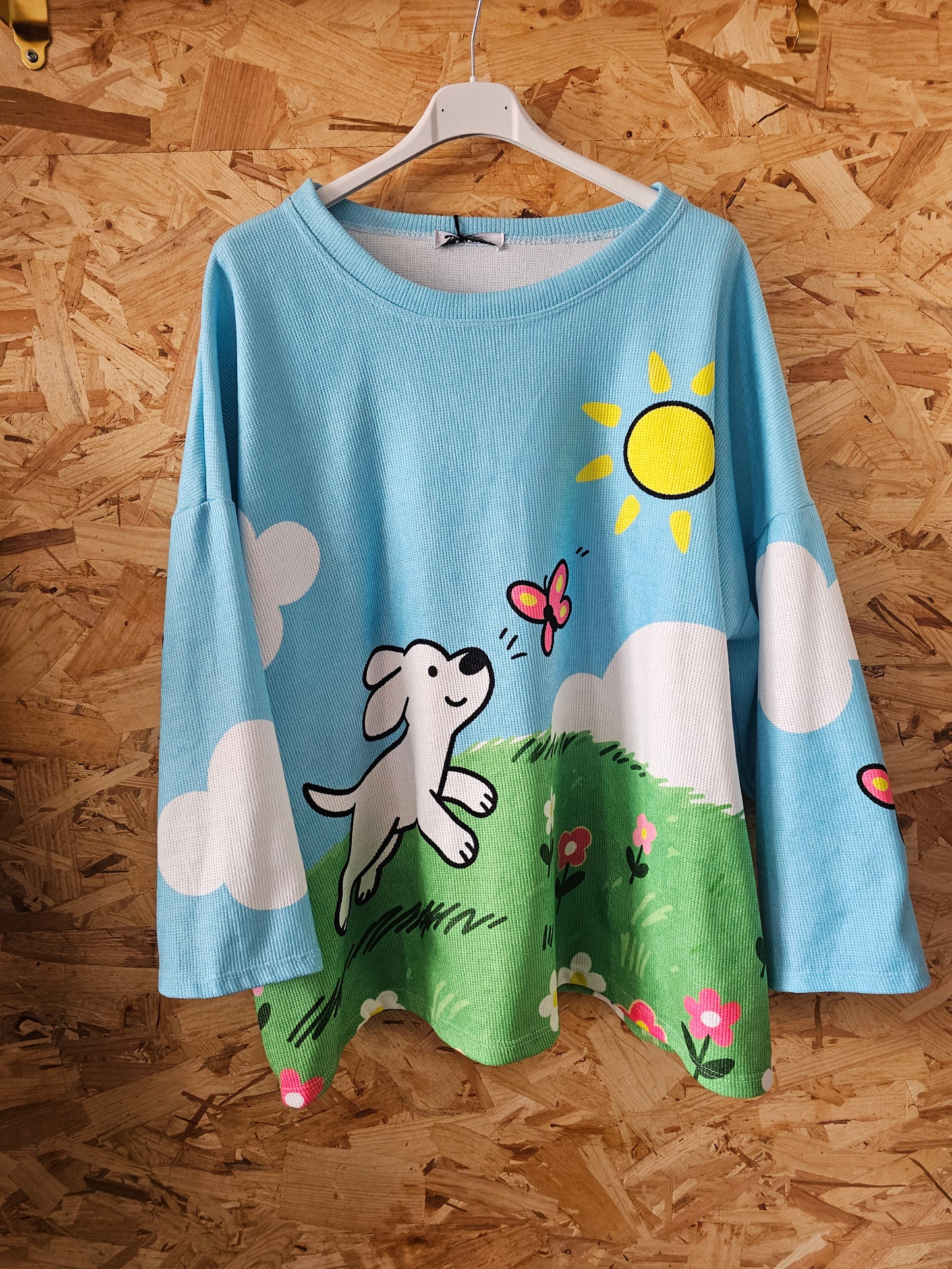Pull scène printanière et toutou