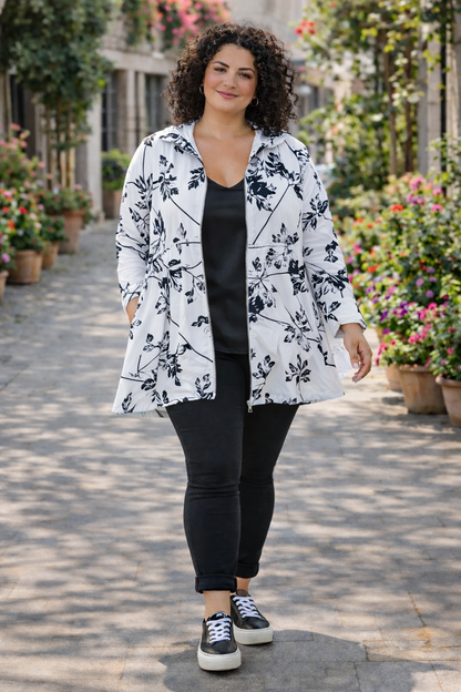 Veste blanche et noire fleurie , coupe évasée